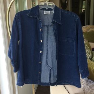 A Chico’s Design denim jacket, deep blue.